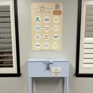 Photo of a donation box for cash or checks