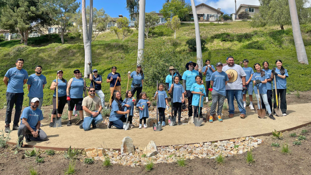 Volunteers holding shovels posing for a picture of volunteers in Yorba Linda, CA